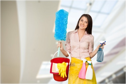 Professional carpet cleaning team following insurance and safety procedures